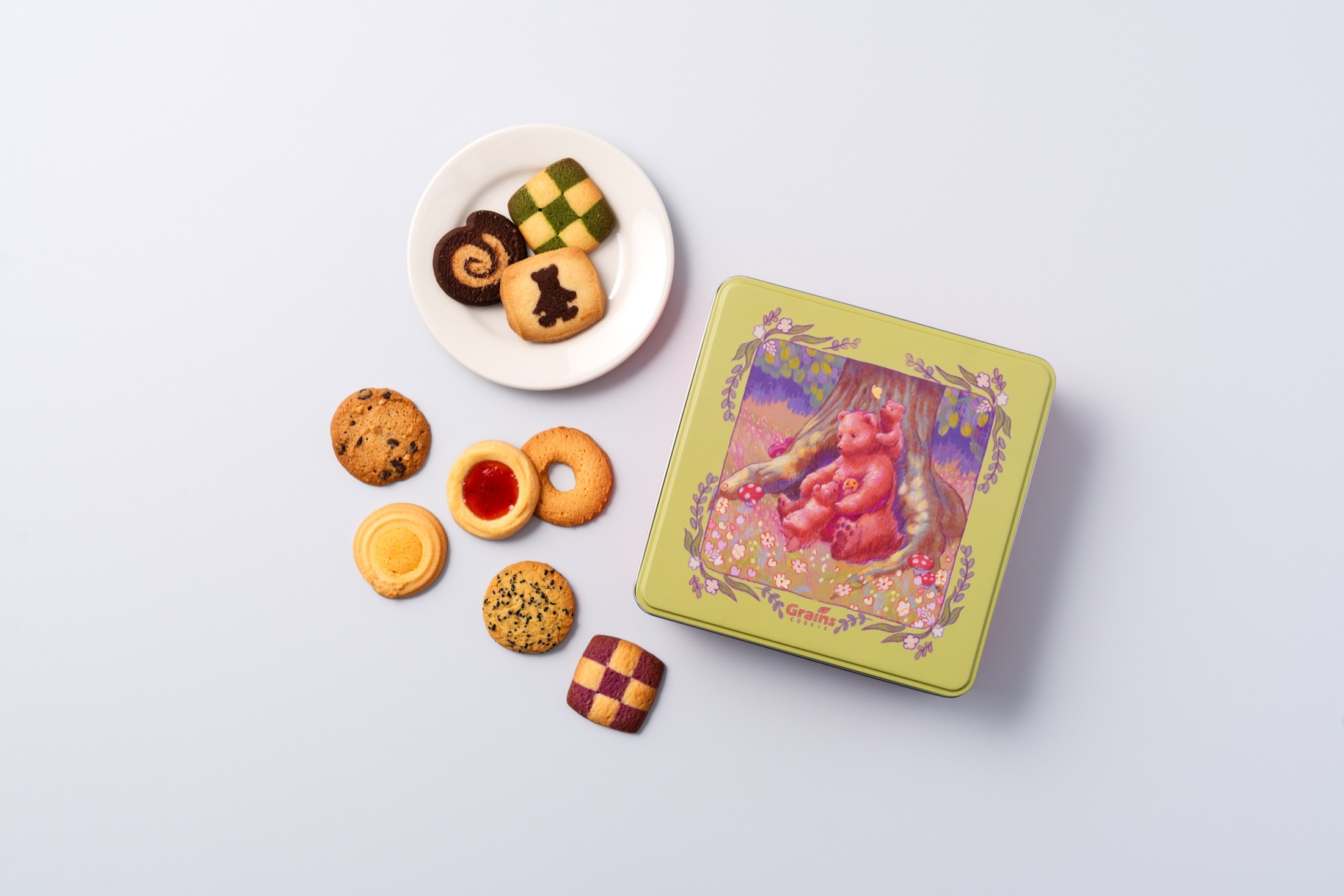 Bear-themed Grains Cookie gift tin and cookies.