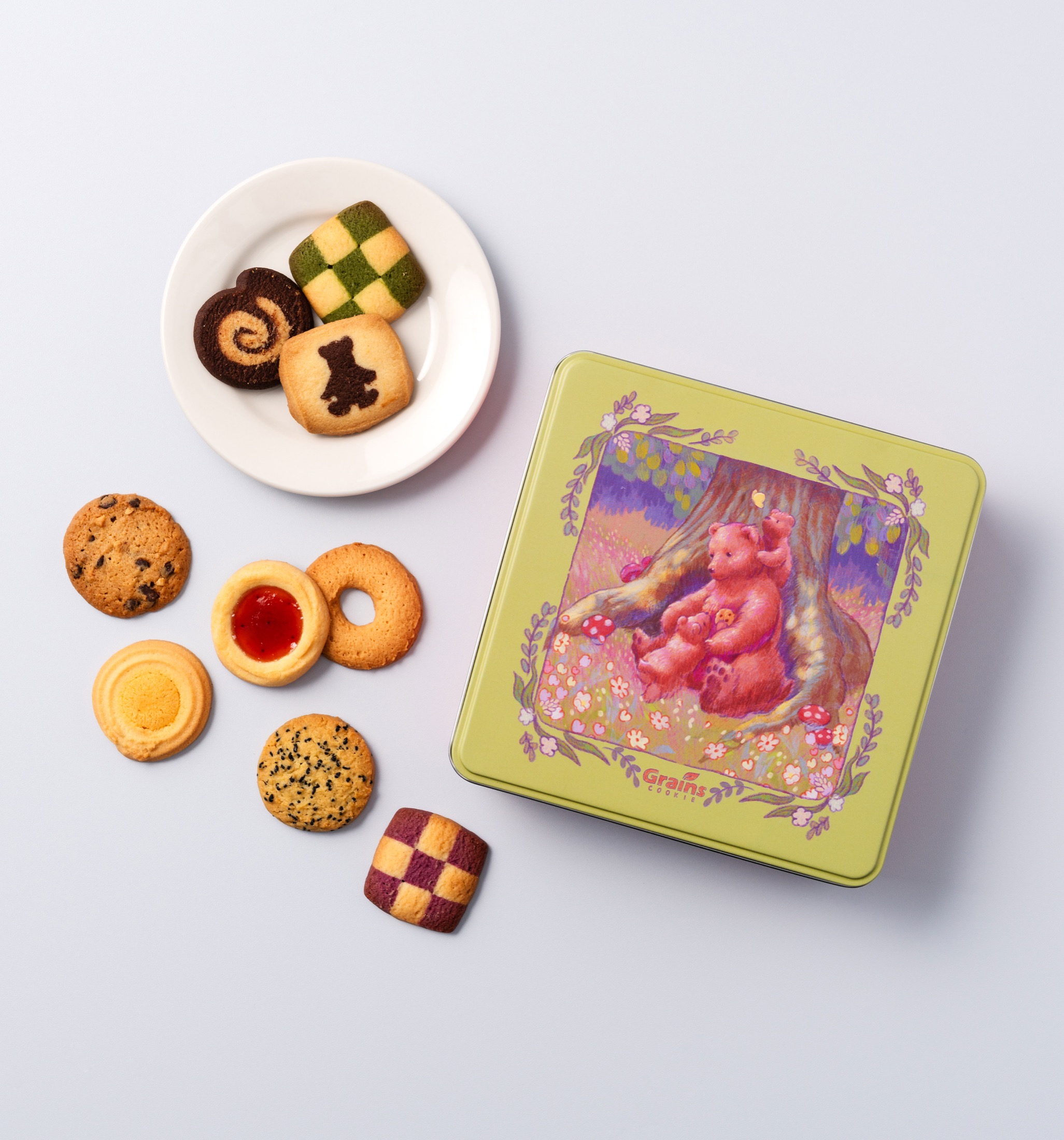 Bear-themed Grains Cookie gift tin with cookies.