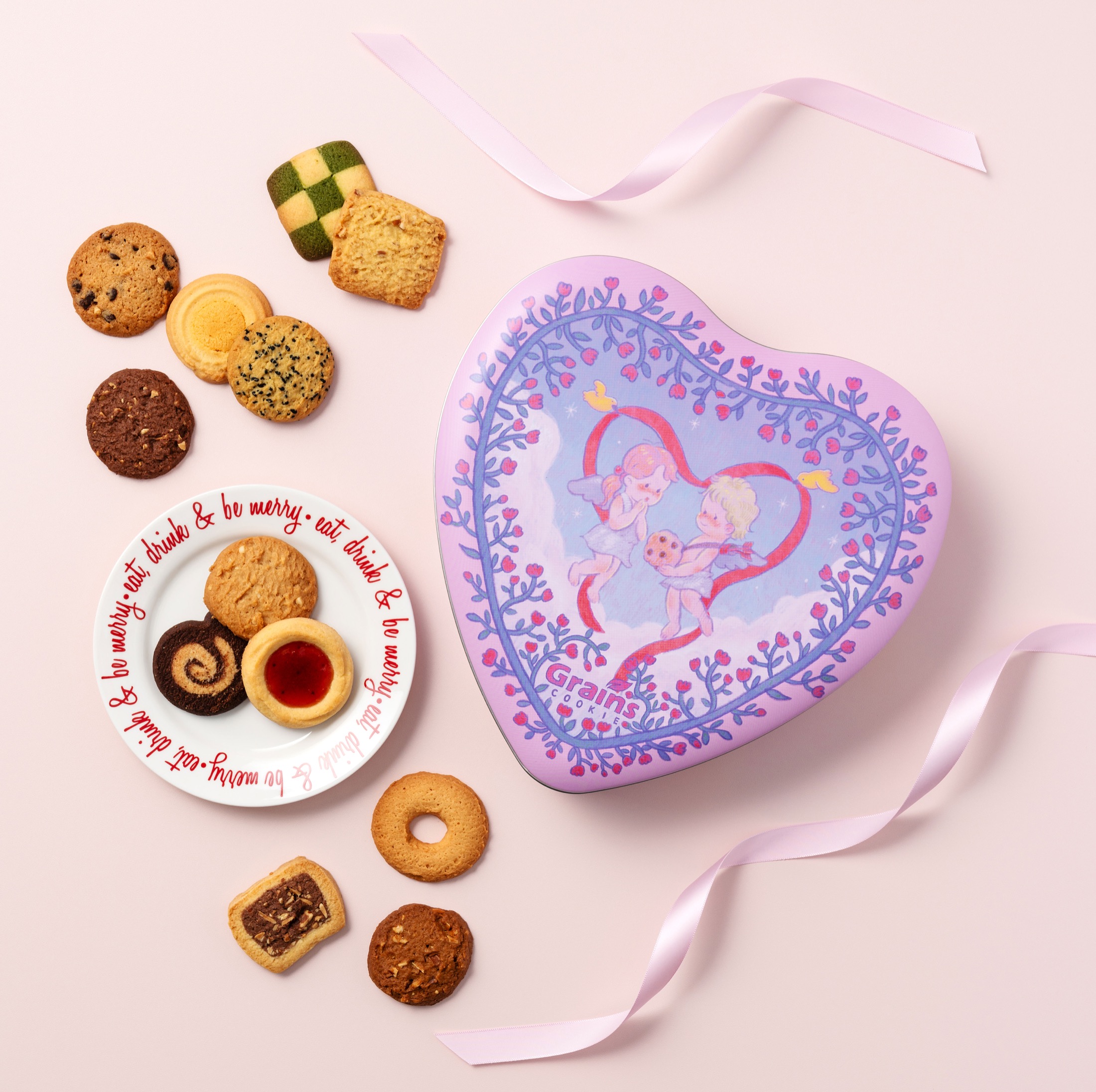 Valentine gift tin with an assortment of cookies.